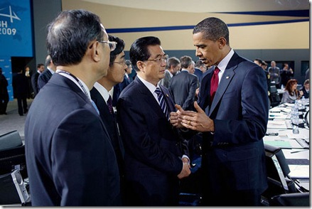President Barack Obama talks with Chinese President Hu Jintao during the morning plenary session of the G-20 Pittsburgh Summit at the David L. Lawrence Convention Center in Pittsburgh, Penn., Sept. 25, 2009. (Official White House Photo by Pete Souza) 